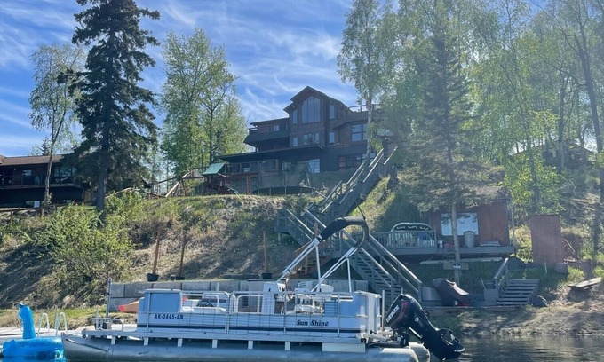 Sand Lake House | Large luxurious lakefront home with water toys & mountain view