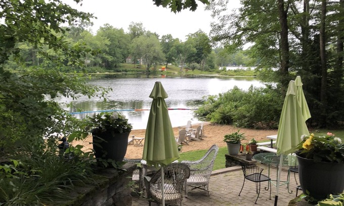 Barrington House | Light, airy, comfy, casual, wooded, lakefront home with private sandy beach
