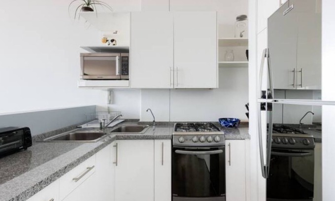Escandon Condo | Loft in fifth floor with great views to green and the city and a roof garden too
