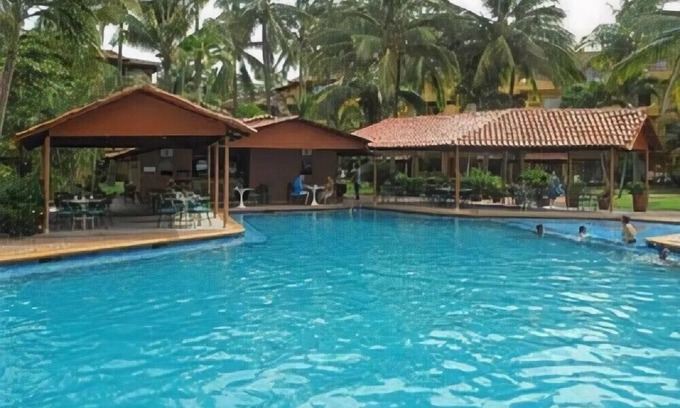 South Hotel Zone Hotel | Los Tules Vibrant 1BR Condo with Balcony for Vacation Spots