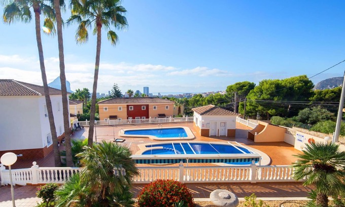 Calpe Apartment | Lovely apartment for 4 people with pool, A/C, TV, patio and parking