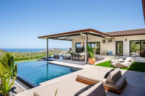 Brasilito House | Luxe Tropical Villa with Sparkling Infinity Pool, Panoramic Ocean Views & Community Amenities