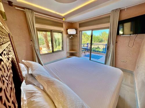 Aguergour House | Luxuary Guesthouse Marrakech lakeside pool activities