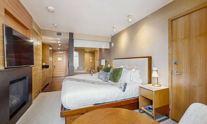 Snowmass Village Apartment | Luxurious hotel room with shared hot tub, on site spa, and ski in/ski out