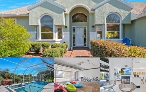 Palm Harbor House | Luxury Canal-Front Home with Heated Pool Spa Bicycles