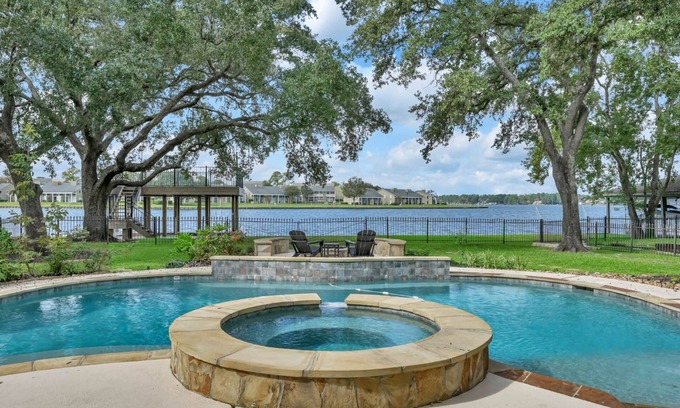 April Sound House | Luxury Waterfront Home with 2 Primary Suites, Pool, Spa, Boat Dock & Breathtaking Views!