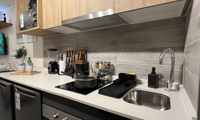 Downtown Santiago Apartment | M&C Departamento República 815