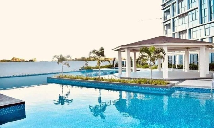 Lapu-Lapu Resort | MACTAN NEWTOWN 1-BEDROOM W/BALCONY & POOL ACCESS