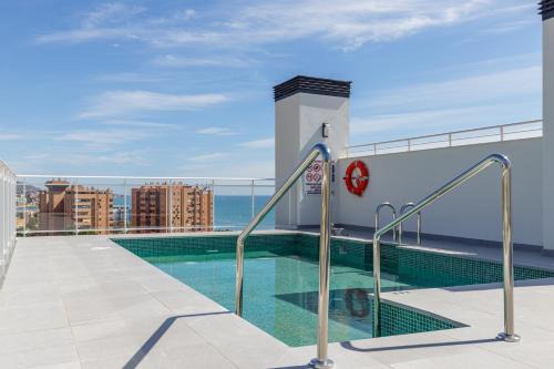 La Malagueta Apartment | Malagueta Miramar with Shared Pool by Caleta Homes