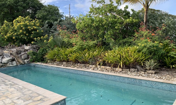English Harbour House | Mamaku Manor, water front property with swimming pool