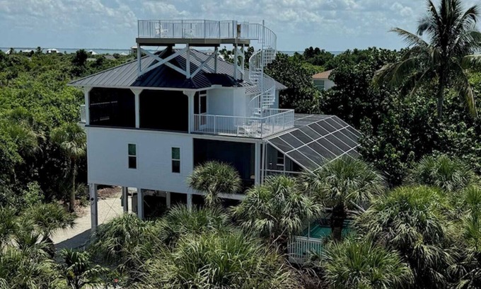 North Captiva House | Manatee Haven: Screened-in Pool, Spa and Elevator! 2 Golf Carts