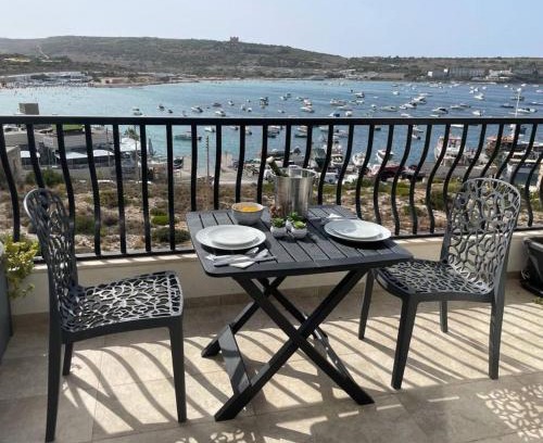 Għadira Apartment | Mellieha Seafront Penthouse By Homely