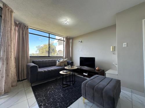 Menlyn Apartment | Menlyn Place Unit 103