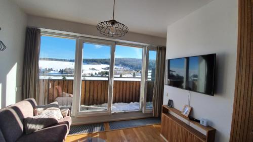 Loucna Pod Klinovcem Apartment | Mezonetový apartmán se dvéma balkóny a výhledem