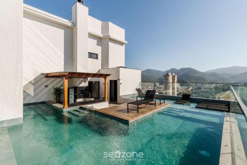 Centro Apartment | MHFBs - Edifício Moderno c/piscina vista mar em Itapema