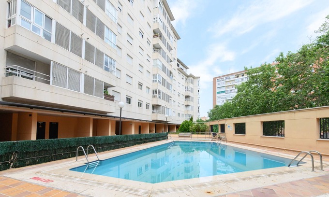 Ciudad Lineal Apartment | Modern 1-bedroom flat with large windows and sofa bed for guests in Madrid
