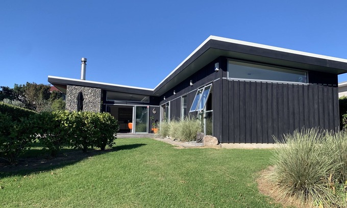 Whiritoa House | Modern family bach, close to beach and park.
