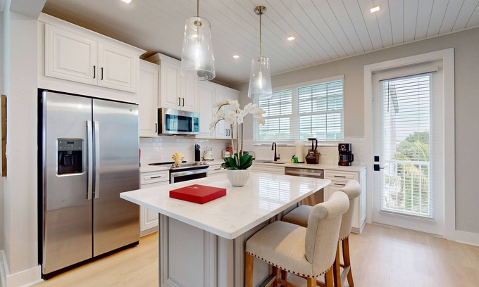 Cortez House | Modern home with screened-in balcony, pool, bikes, & EV charger - great location