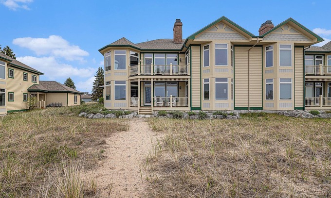 Manistee Condo | Modern Main Floor Waterfront Condo