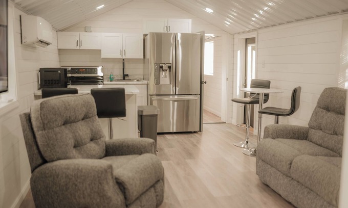 Greensburg Cabin | Modern Secluded Riverfront Cabin