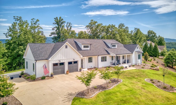 Mill Spring House | Mountain & lake-view luxury home with hot tub, deck, & pergola - dog-friendly
