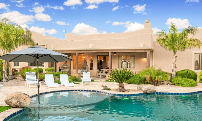Anthem House | Mountain-view stay with sprawling outdoor space, pool, hot tub, & putting green