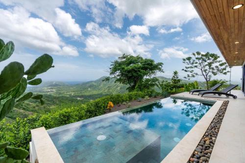 Rio Seco House | Mountainside Home with Modern Design Sweeping Ocean Views & Private Swimming Pool