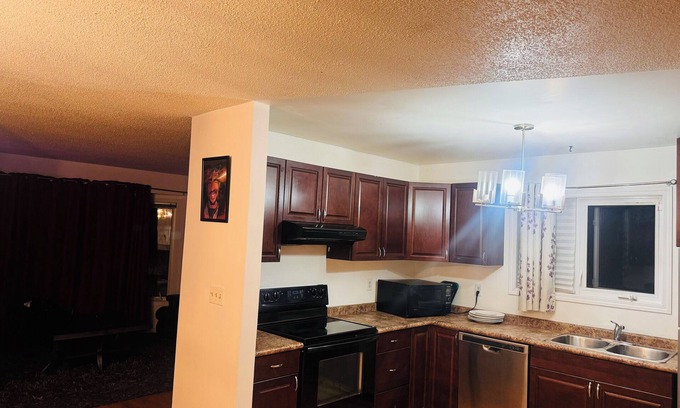 Northeast Edmonton House | Neon Lights Staycation. 4 BDR, Jacuzzi, VIP Lounge, 2 Living Rooms.