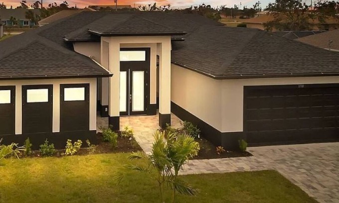 Trafalgar House | New Construction - Elegant Fresh Water Canal Home w/Heated Pool
