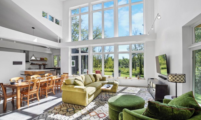 Portage House | New Modern Cabin, Hot Tub & Kayaks on WI River near Devil’s Lake & WI Dells