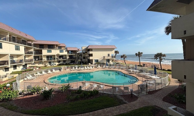 Volusia County Condo | NEW RENTAL! Beautiful Beachfront Condo on Ormond Beach w Pool! Sit Back & Relax!