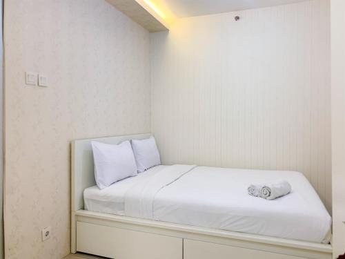Pluit Apartment | Nice Designed 2BR with Pool View at Green Bay Pluit Apartment By Travelio