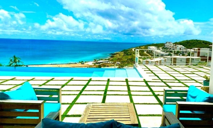 Indigo Bay Villa | Oceanfront Bliss: 3-Bedroom Escape with Breathtaking Views & Tropical Charm!