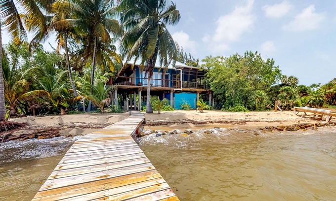 Plantation House | Oceanfront family home w/ mountain & ocean views, shared dock, WiFi, partial AC!