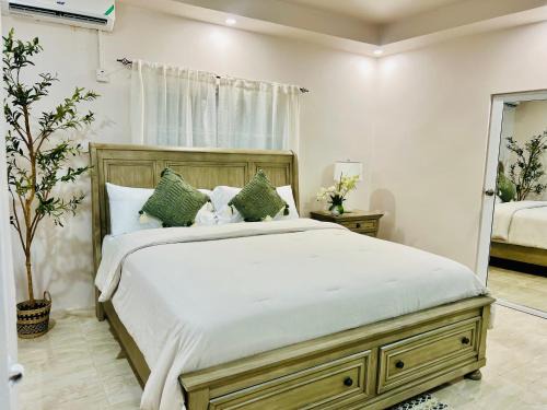 Runaway Bay House | Olive Breeze II