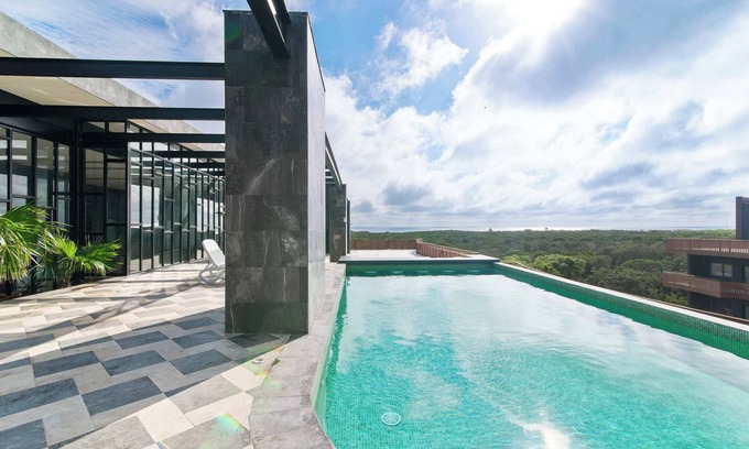 Playa Paraiso Condo | One block from beach in Hotel Zone-Free Beach Club