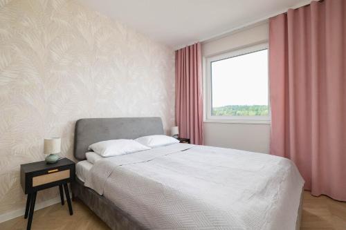 Zywiec Apartment | Pastel Apartment with Balcony and Parking by Noclegi Renters
