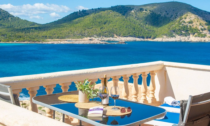 Cala Agulla House | PERLETA - Fabulous penthouse with sea views, swimming pool, and free WiFi.