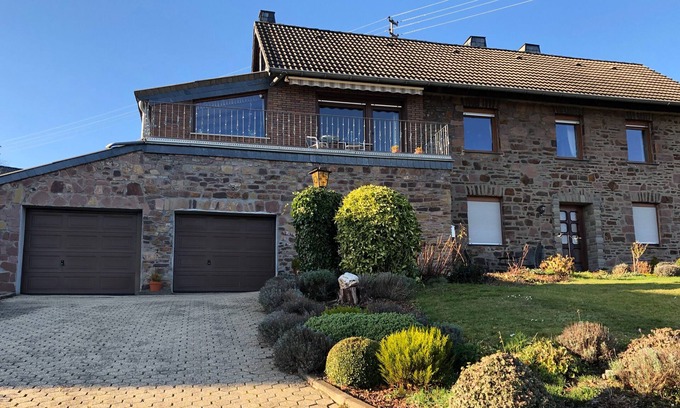 Mechernich House | Picturesque quarry stone house: relaxation in the Eifel