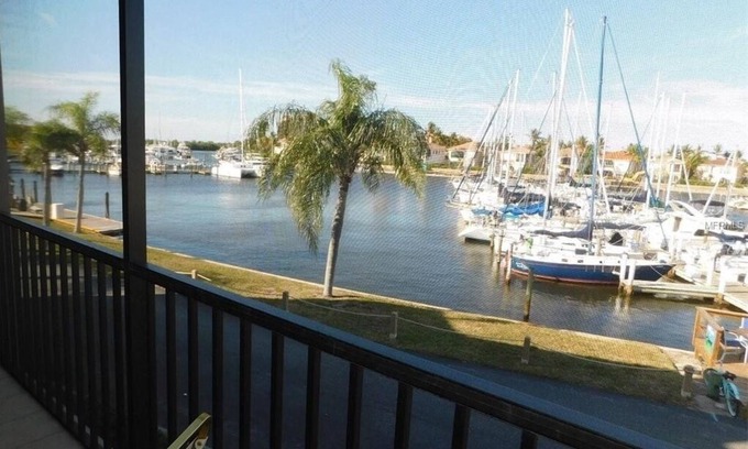 Burnt Store Marina Condo | Pirate's Paradise-don't have to walk the plank for this great harbor view!