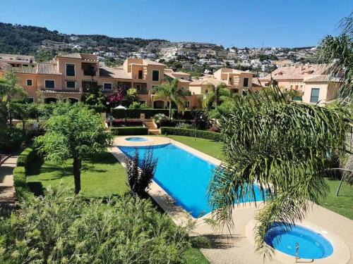 Javea Apartment | Piso bonito cerca de la playa con piscina, jardín, gimnasio y garaje