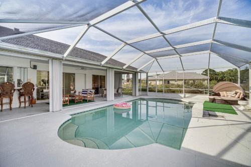 Port Saint Lucie House | Port St Lucie Canal-Front Home with Heated Pool!