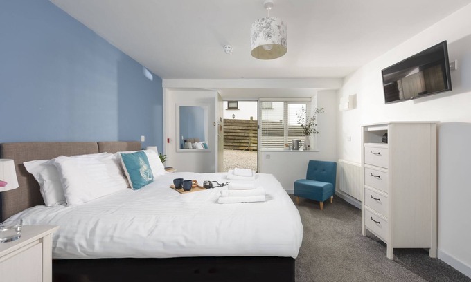 St Just Hotel | Porthcurno, B&B - a hotel room that sleeps 2 guests in 1 bedroom