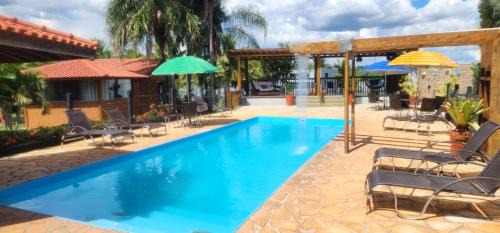Delfinopolis Hotel | Pousada Lago Azul