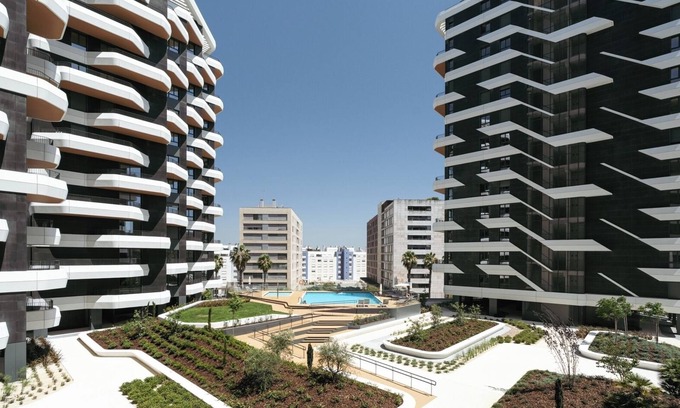 Parque das Nacoes Apartment | Premium Flat w/Balcony and Pool by HostWise