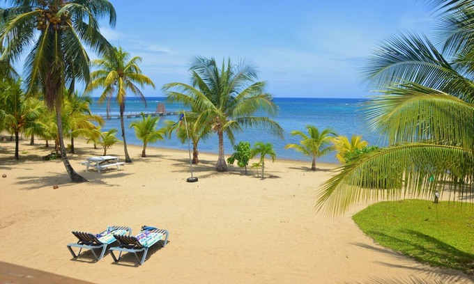 Antoneys Cay House | Private, beachfront house on 2.5 acres with fruit trees, owners nextdoor to help