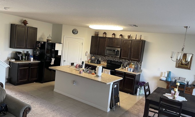 Haines City House | private master bedroom with bathroom in the comfy house