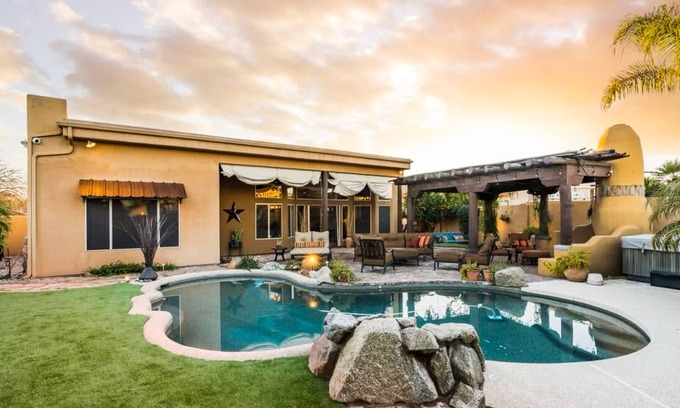 La Paz At Desert Springs House | Pueblo-style home with private pool, patio, lovely yard, kiva fireplace, firepit