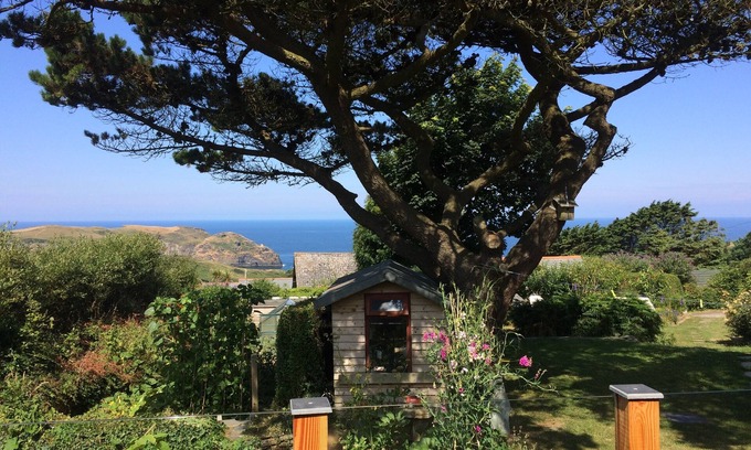 Tintagel Ski Chalet | Quiet chalet with beautiful rural and sea views near St Nectan's waterfall.