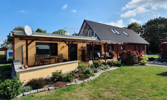 Garz/Rugen Apartment | Quiet situated bungalow with a terrace overlooking the water and in nature